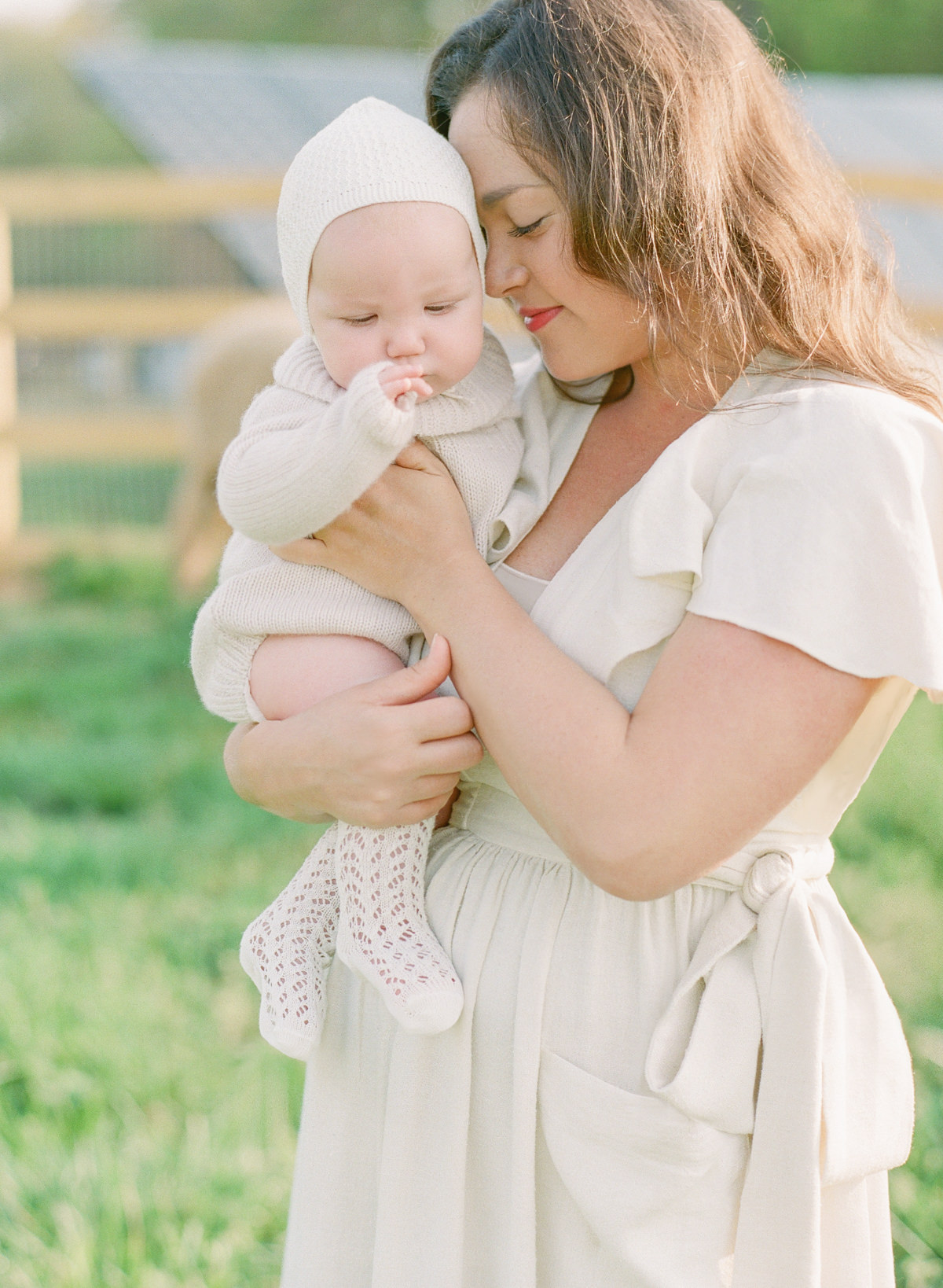Kent-Avenue-Photography-Charlotte-Newborn-Photographers-On-Film-Mom-snuggling-daughter