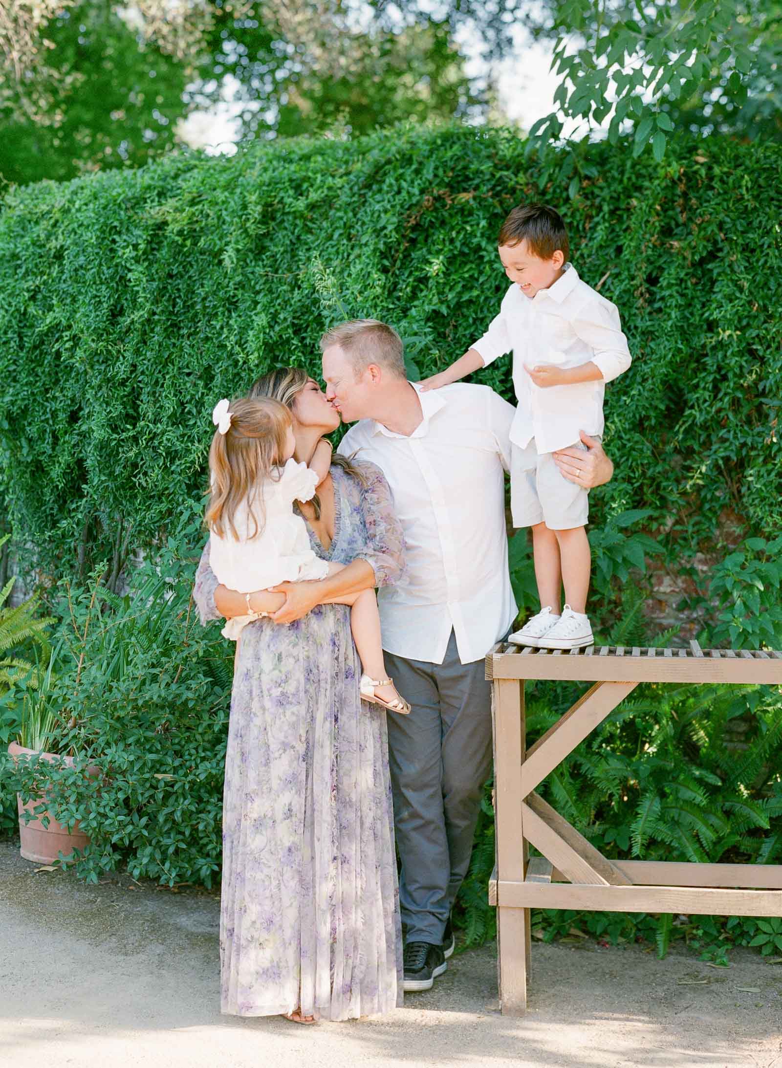 A Timeless Family Session at Gamble Gardens- Light and airy family photography - San Francisco Bay Area Family Photography on Film - Family on Film - California Family Session - Mom and Dad looking at Children - Kent Avenue Photography - www.kentavenuephotography.com