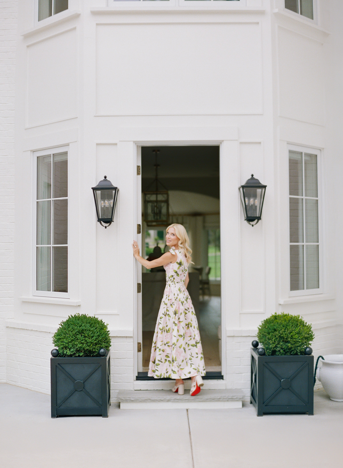 Mother photographed on film during a relaxed portrait session in Charlotte